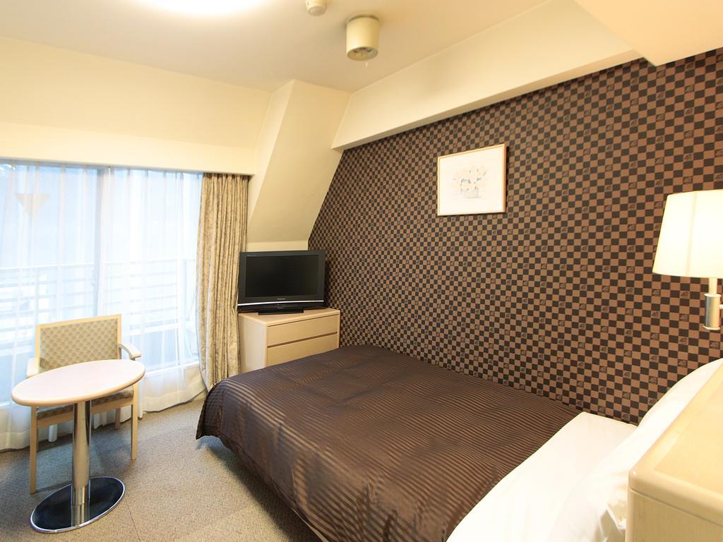 Deluxe Single Room Non-Smoking,141147309:JPEG