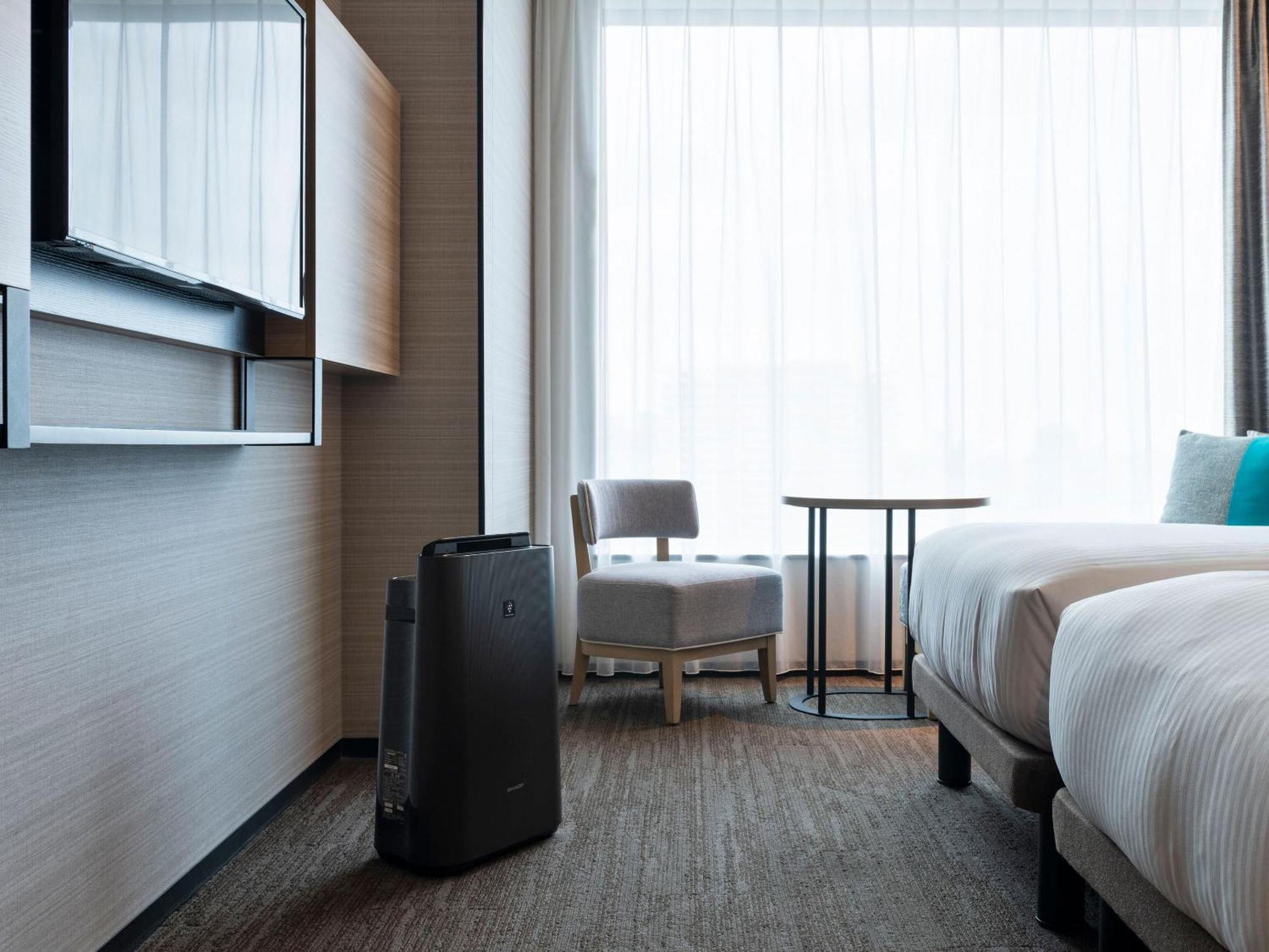 Quarto com 2 Camas de Solteiro - Acesso para Hóspedes com Mobilidade Reduzida