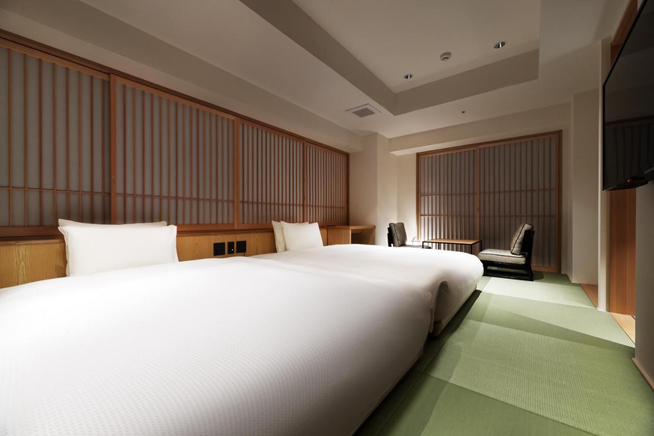 Corner Twin Room City View Upper Floor,965339551:JPEG